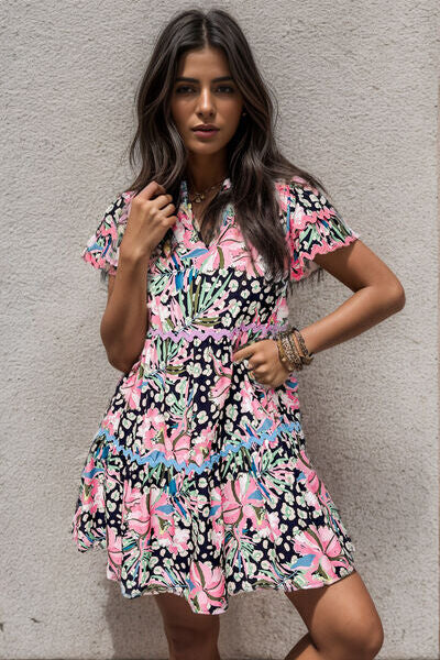 Chic Printed Mini Dress with Ruffle Hem and Short Sleeves