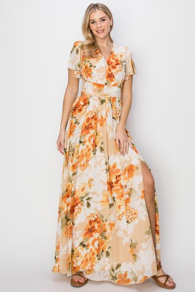 Chic Floral Tie-Back Maxi Dress with Short Sleeves and Slit Detail by HYFVE